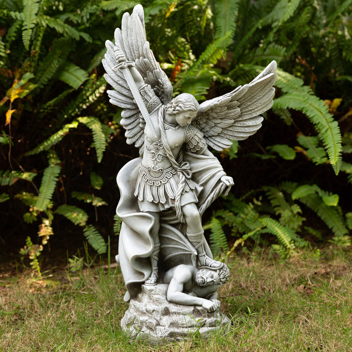 DevotedWalls Saint Michael battle pose statue as garden focal point.