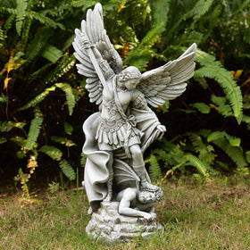 DevotedWalls Saint Michael battle pose statue as garden focal point.