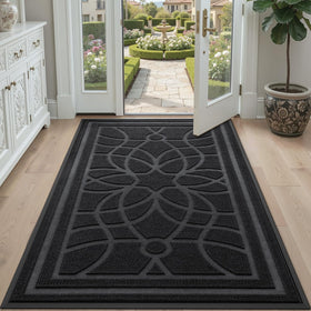 DEXI 6x4 black mat complements modern entryways while trapping debris.