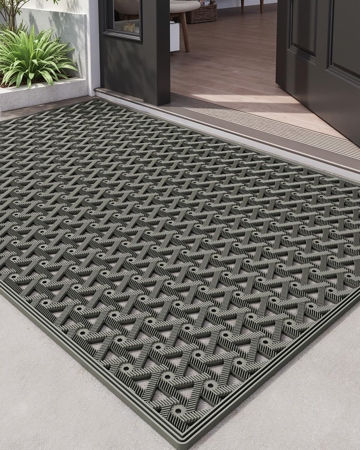 DEXI front door mat outdoor close-up showing dirt-trapping grooves for cleaner shoes.