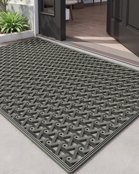 DEXI front door mat outdoor close-up showing dirt-trapping grooves for cleaner shoes.