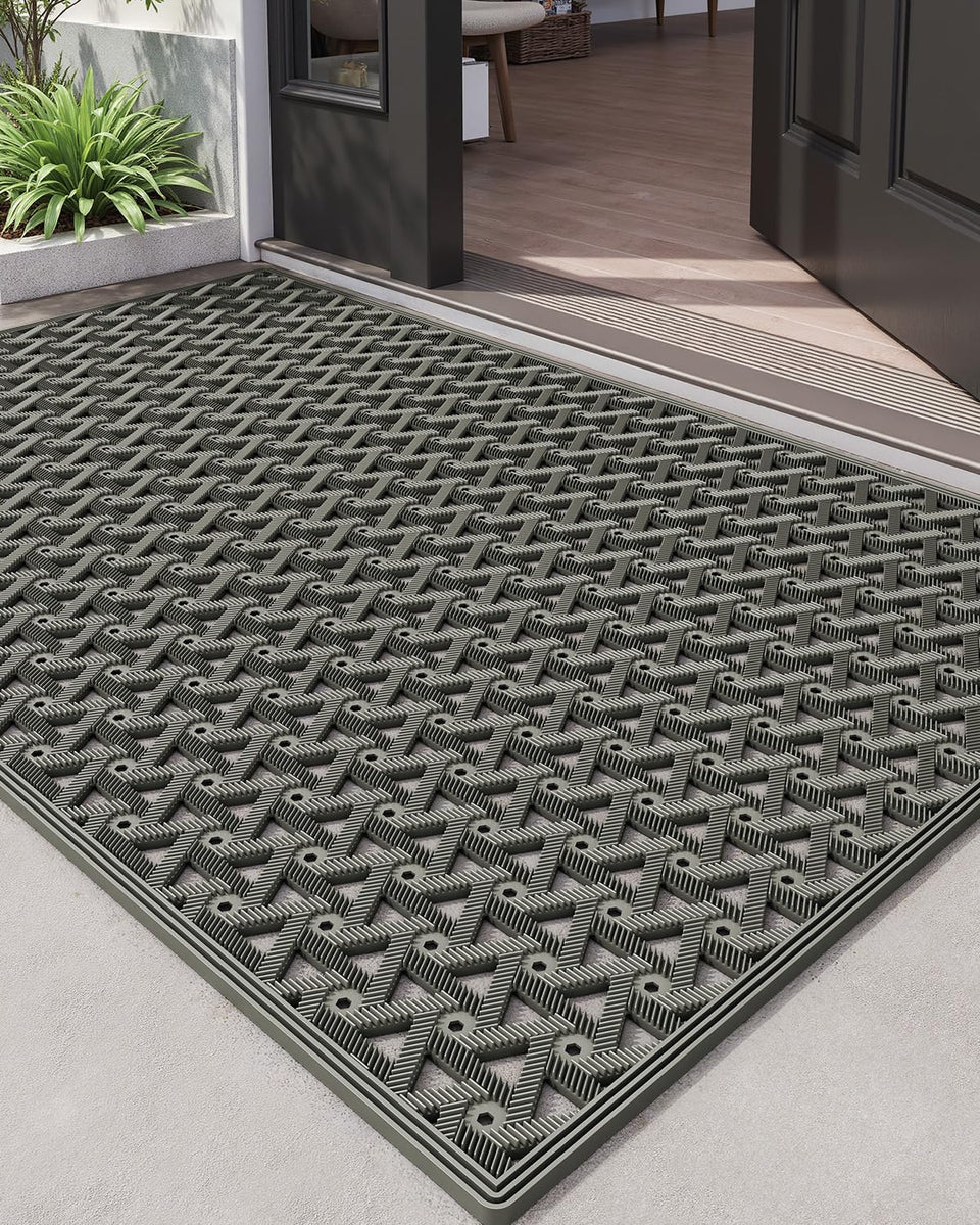 DEXI front door mat outdoor close-up showing dirt-trapping grooves for cleaner shoes.