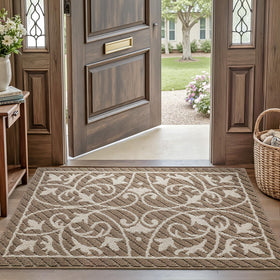 DEXI brown entry mat complements entryway decor and warmth.