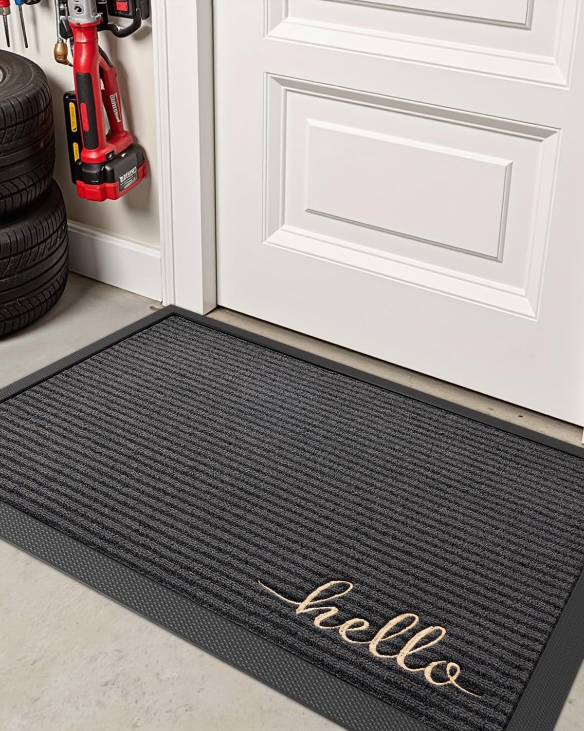 DEXI front door mat hello-grey-color complements modern entry aesthetics.