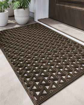 DEXI front door mat for outdoor entrance with brown finish and rugged grip.