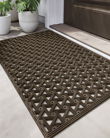 DEXI front door mat for outdoor entrance with brown finish and rugged grip.