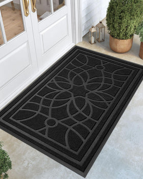 DEXI front door mat outdoor pattern captures dirt at the doorstep