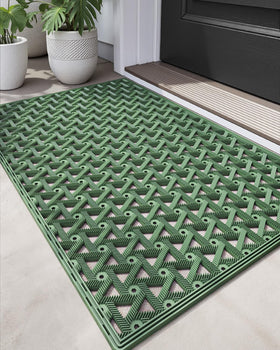 DEXI front door mat in green with anti-slip backing for safe entry.