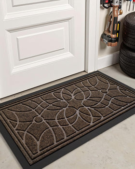 DEXI patio and garage entry mat welcomes guests while trapping moisture.
