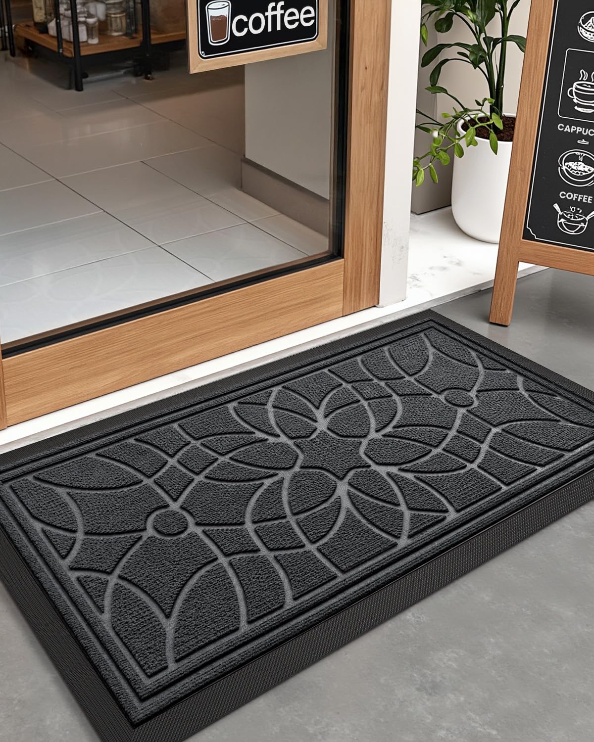 DEXI grey outdoor mat complements any entryway.