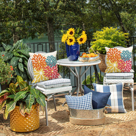 DFXSZ pillow covers shown on outdoor patio furniture setup