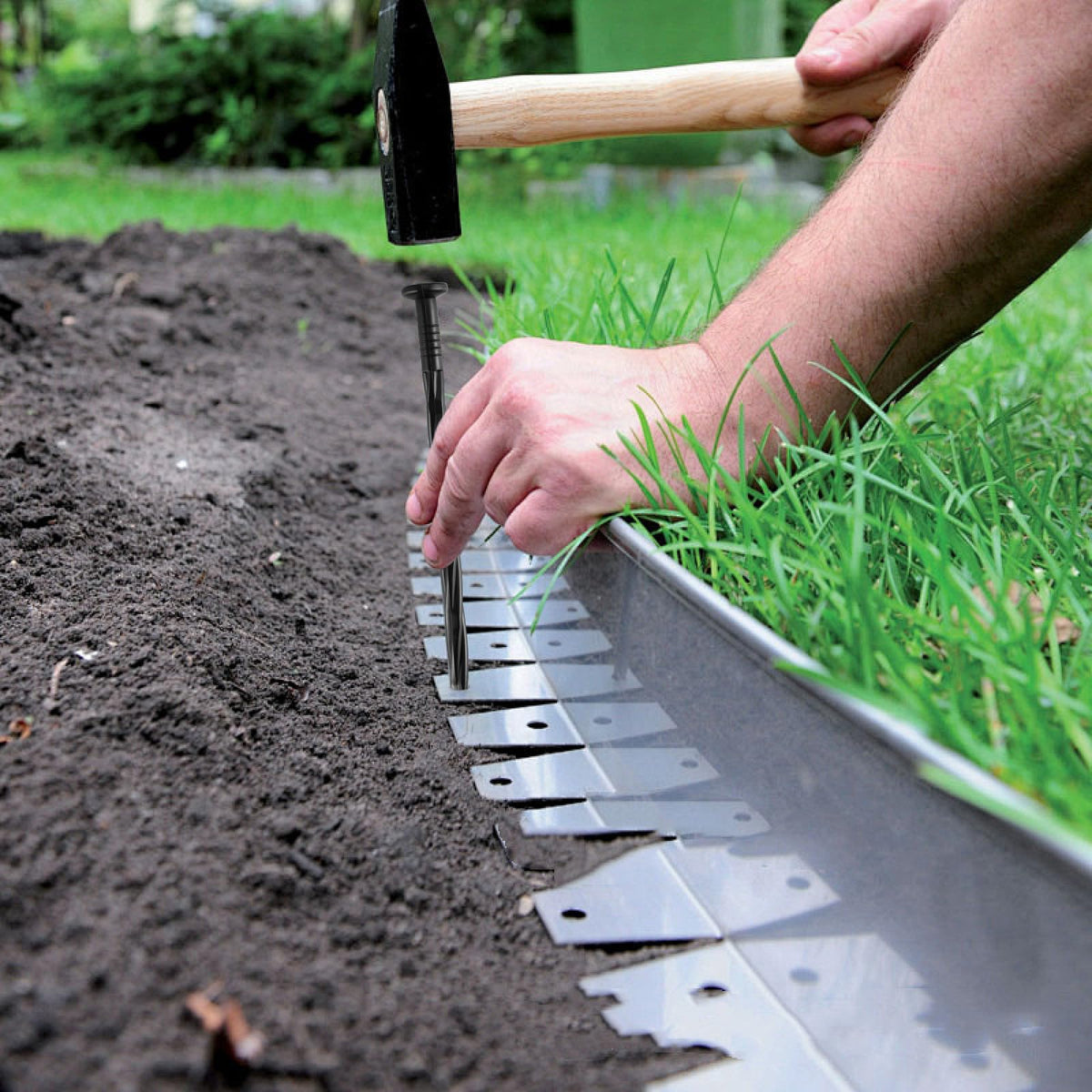 DharBnt landscape edging stake showing fast, easy installation in outdoor settings.
