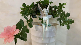 Dianreno angel figurine garden resin highlights timeless white wings for elegant backyard decor.
