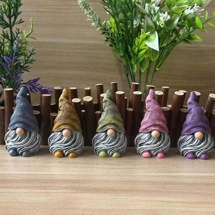 Dianreno mini gnomes figurines set adds whimsical charm to plant pots.