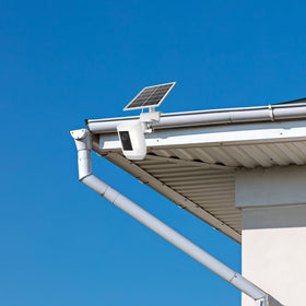 Didalo solar panel charges Outdoor Cam Plus battery under sun exposure.