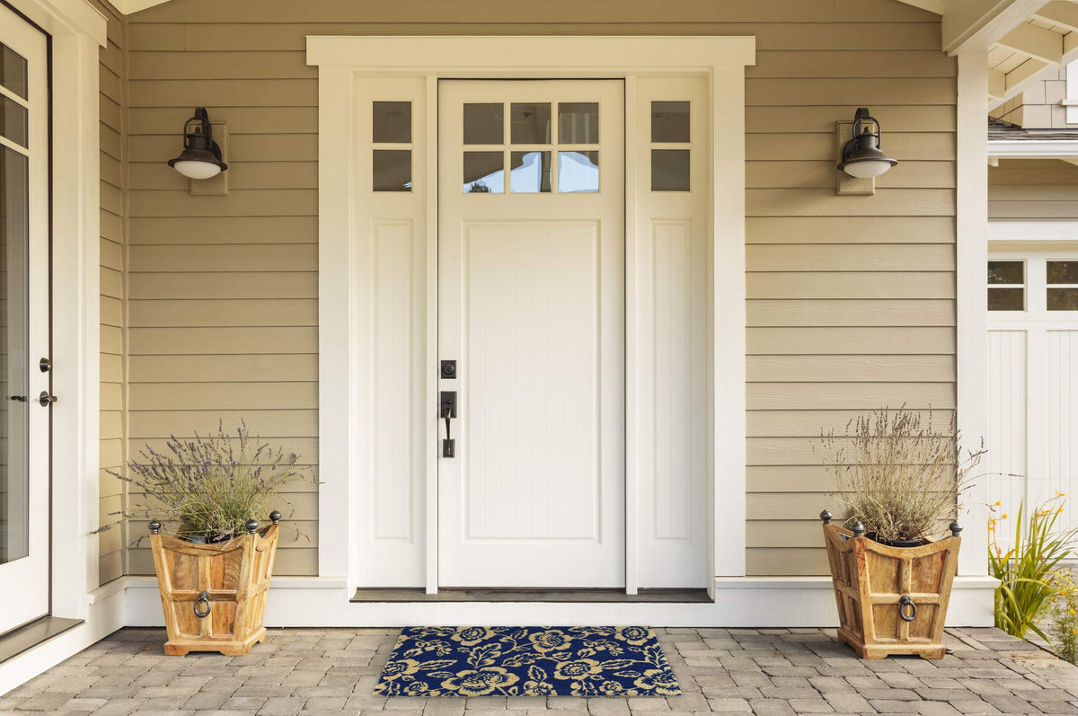 DII floral design coir doormat suited for outdoor-indoor transitions.
