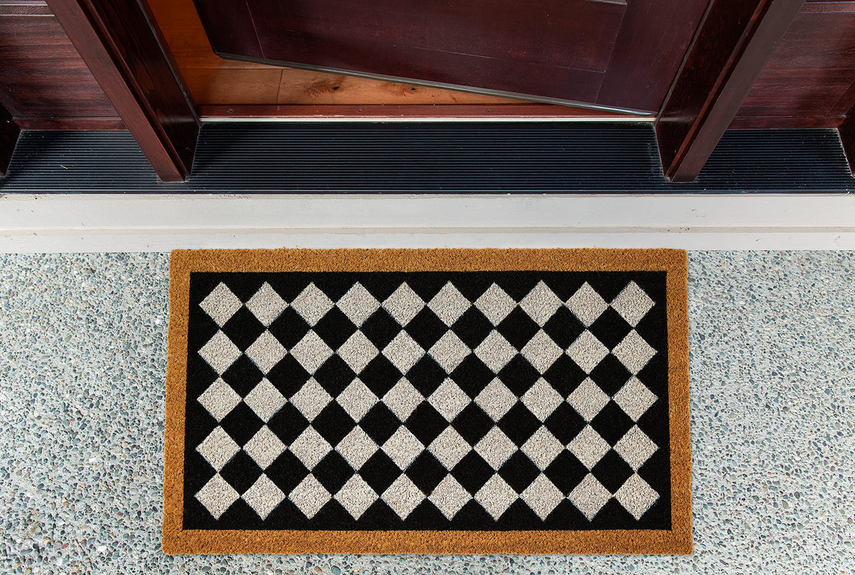 DII harlequin geometry on porch demonstrates stylish welcome.