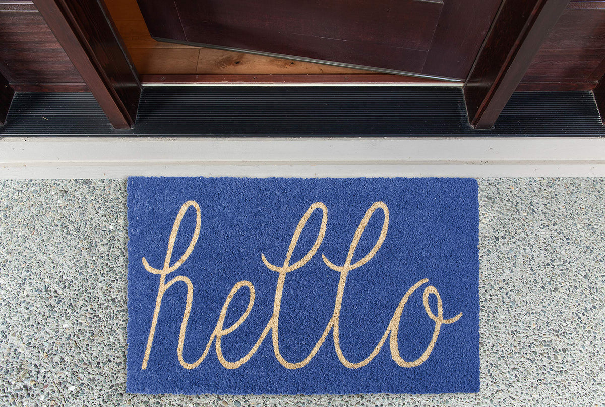 DII Hello Coir Fiber Doormat at entryway in blue for easy door clearance