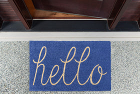 DII Hello Coir Fiber Doormat at entryway in blue for easy door clearance