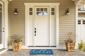 DII Hello Coir Fiber Doormat on patio/porch in blue for high-traffic areas