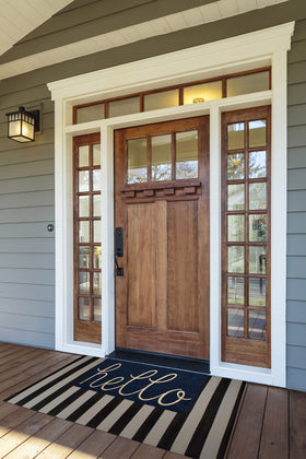 DII Hello Coir navy mat demonstrates indoor-outdoor versatility for foyers.