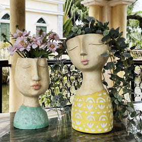DiliComing 11-inch tall planter elevates plant displays in any space.