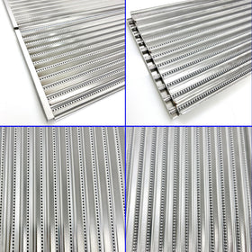 DS123 emitter plate surface with many holes designed to distribute heat efficiently.