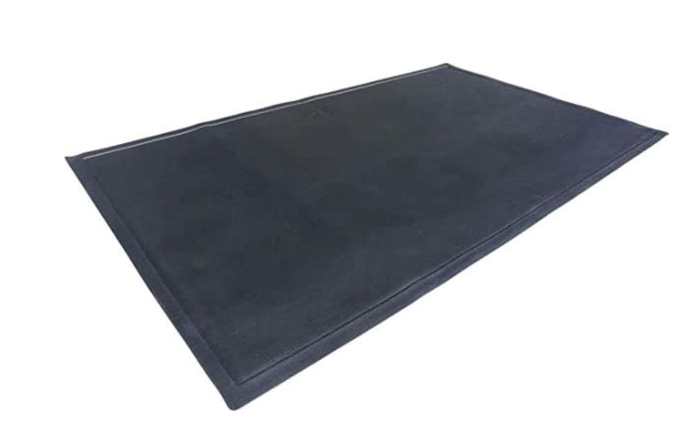 DiversiTech Ultra Grill Mat protecting a wooden deck from heat and drips