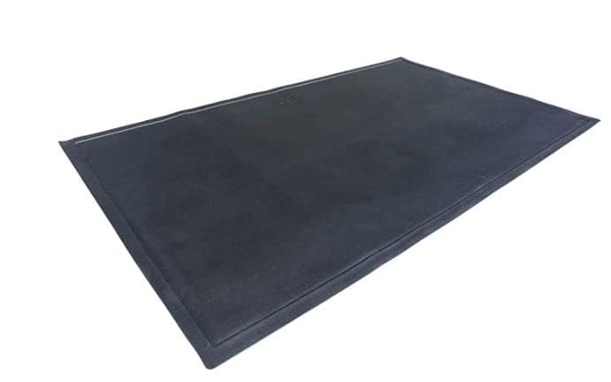 DiversiTech Ultra Grill Mat under a fire pit containing embers
