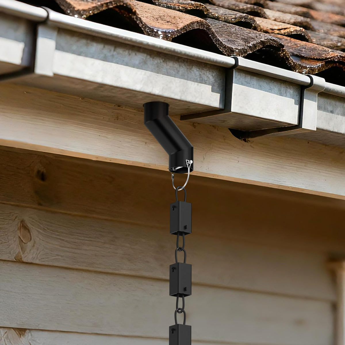 DIYIIRON rain chain adapter demonstrates efficient water flow from gutter to drainage