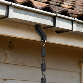 DIYIIRON rain chain adapter demonstrates efficient water flow from gutter to drainage