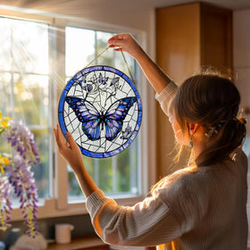 DOUHASU purple butterfly suncatcher creates warm rainbow reflections at sunrise
