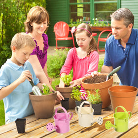 DOITOOL durable metal watering cans in mixed colors for rust-free outdoor use.