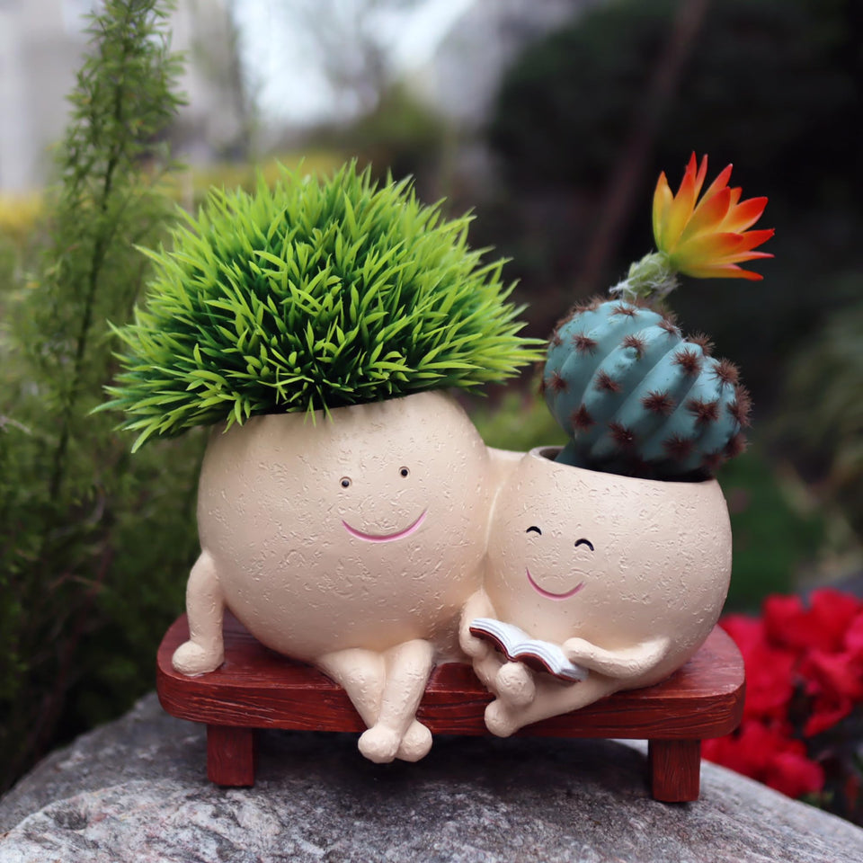 Dolkgy Face Pots head vase on shelf adds whimsy to indoor decor.