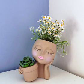 Dolkgy head flower pot suitable for indoor and outdoor displays.