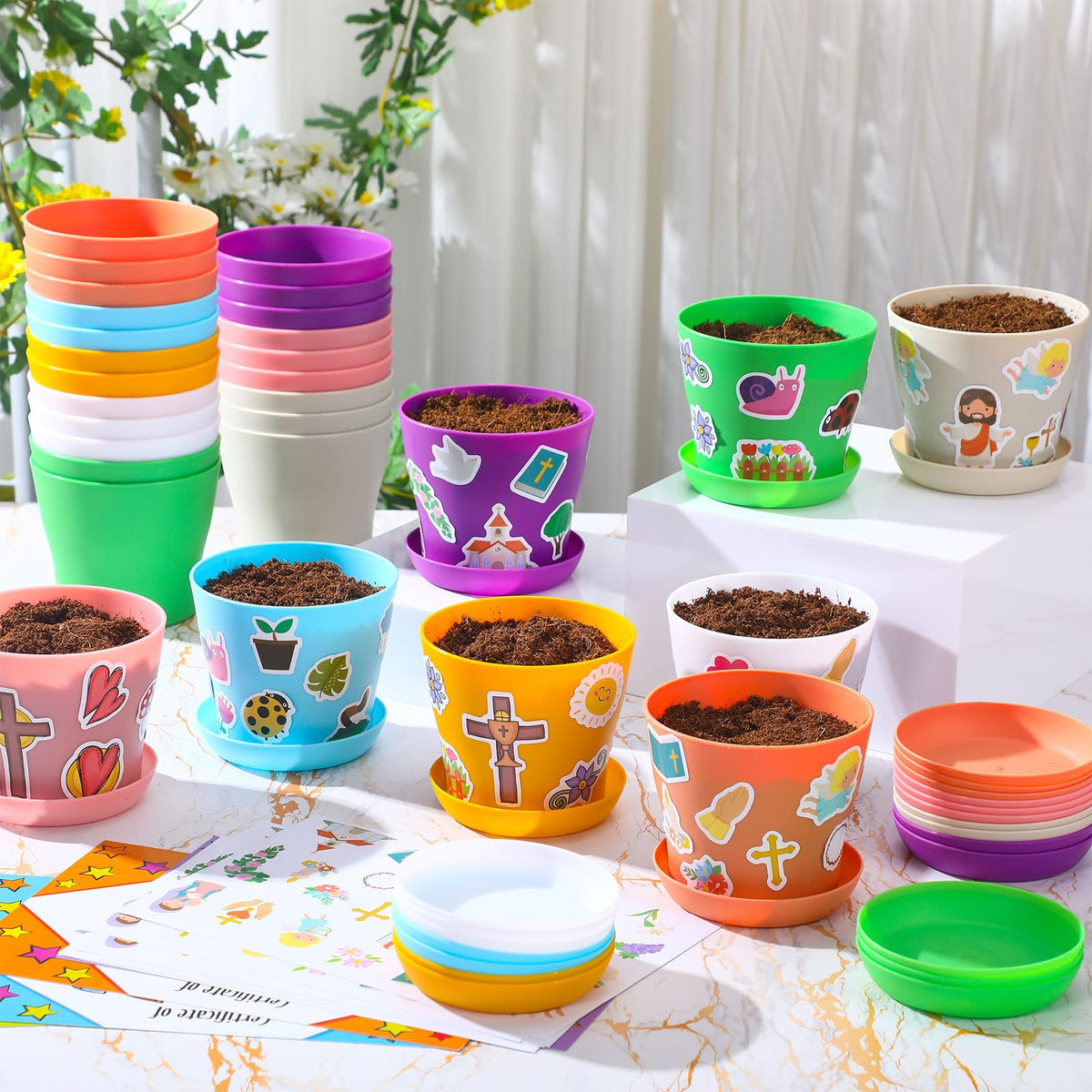 Domensi kids decorating pots during a hands-on planting activity.