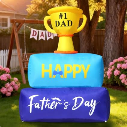 DomKom Fathers Day inflatable trophy with LED lights brightens the yard.