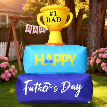 DomKom Fathers Day inflatable trophy with LED lights brightens the yard.