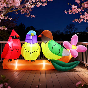 DomKom LED birds illuminate the garden at dusk for ambience.