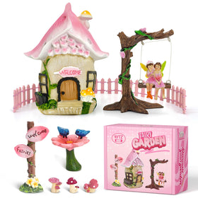 DONABELA pink fairy house enhances indoor shelves with whimsical charm.