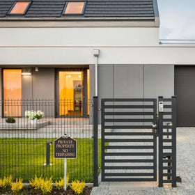 Doninex black and gold design elevates curb appeal at entrances.