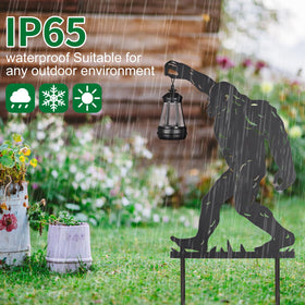 Doorkeer stake with ground plugs for secure lawn installation.