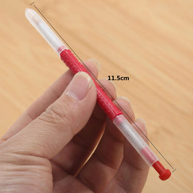 Dophee larva transfer tool in hand enabling careful queen cell work.
