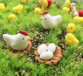 DoTebpa white hen figure adds charm to terrariums.