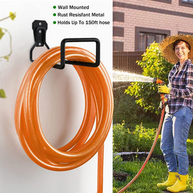 Wall-mounted Dotet hose organizer prevents tangles during watering