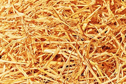 Double F Farms straw bedding for chickens in a coop.