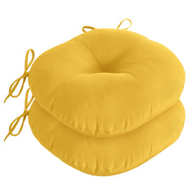 Downluxe Bistro Round Yellow Cushion front view enhances outdoor seating.