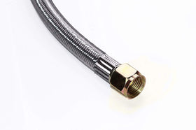 DOZYANT regulator in use on grill for safe, adjustable gas flow.