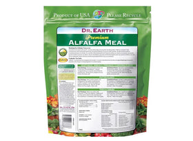 Dr. Earth Alfalfa Meal Plant Food 3lb in garden soil supports healthy growth