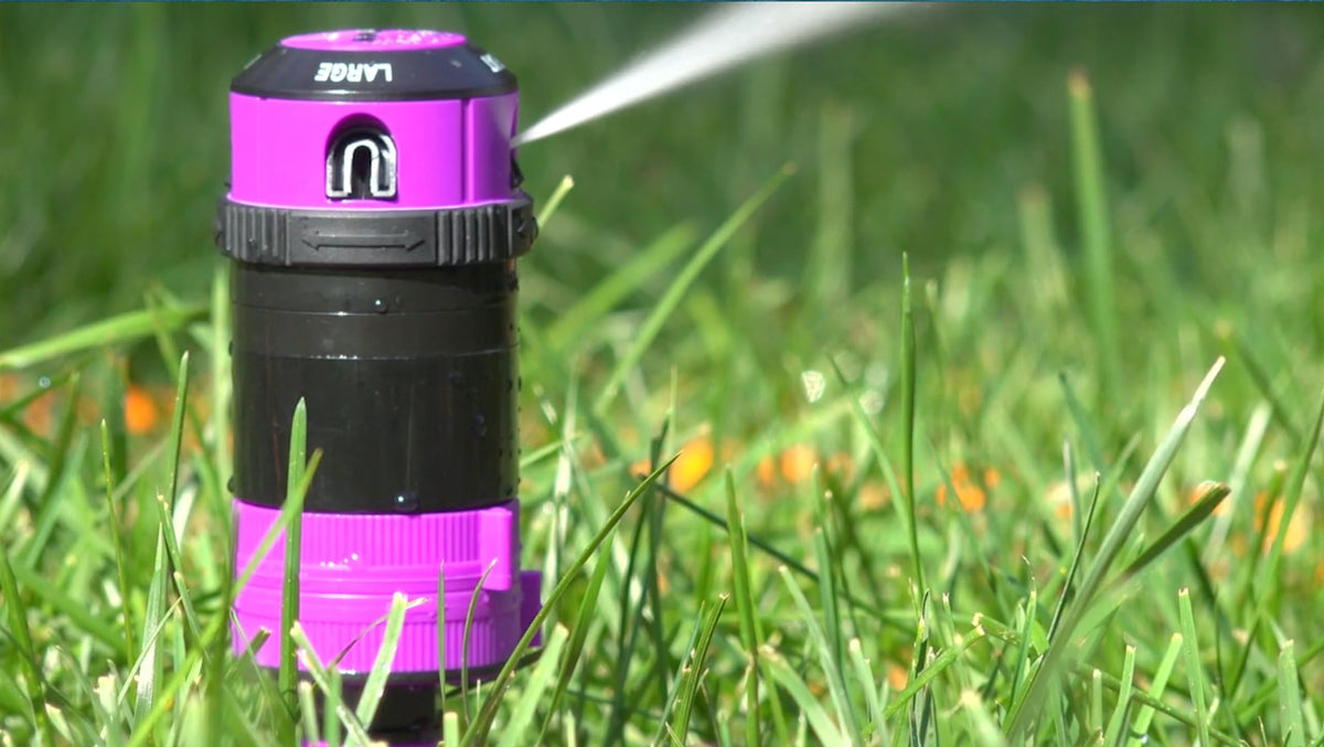 Dramm ColorStorm Gear Drive Sprinkler on a die-cast base ready to move across turf.